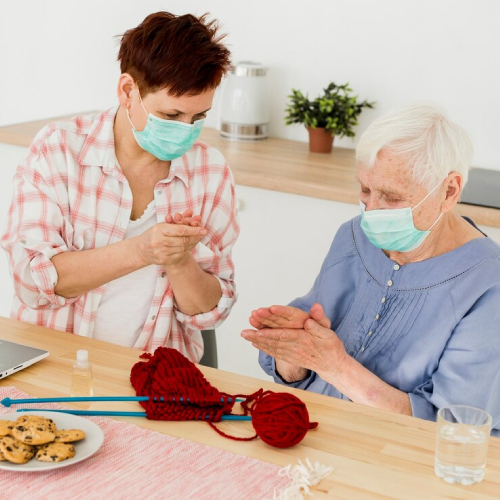 Caregiver providing gentle guidance on daily home routines.