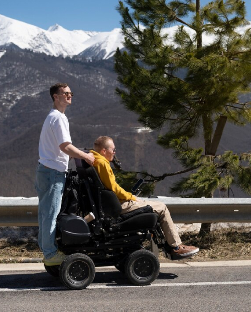 Friendly driver assisting an NDIS participant.